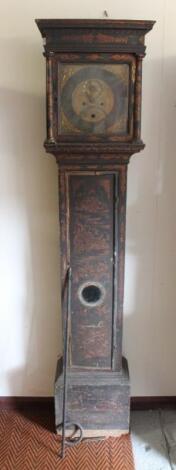 A brass faced longcase clock