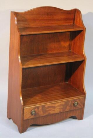 A 20thC mahogany waterfall bookcase