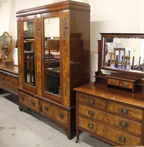 An early 20thC walnut veneered harlequin bedroom trio