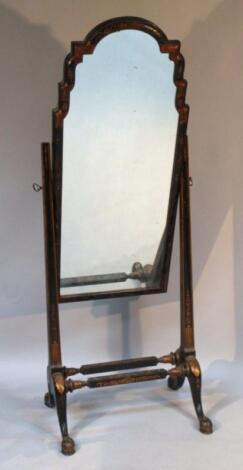 A Japanned ebonised cheval mirror