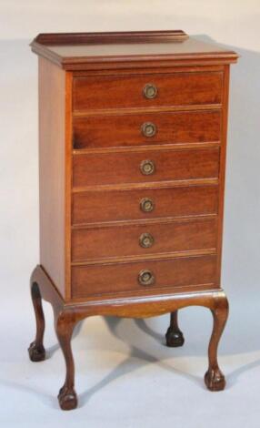 An early 20thC mahogany music Canterbury