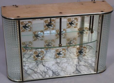 A 1950's glass hanging cabinet