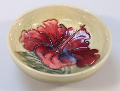 A Moorcroft Hibiscus pattern dish