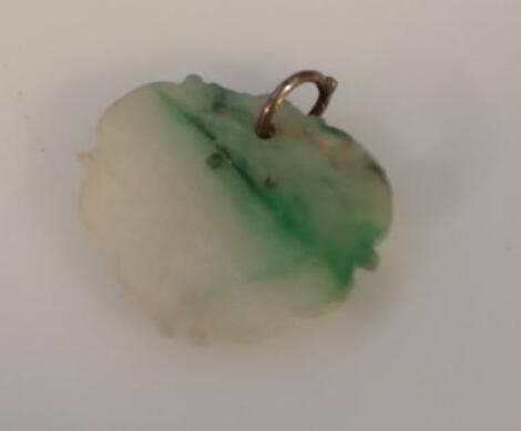 A Chinese pale and green fused jade pendant