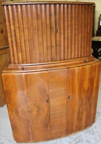 A mid 19thC walnut veneered D-end cocktail cabinet