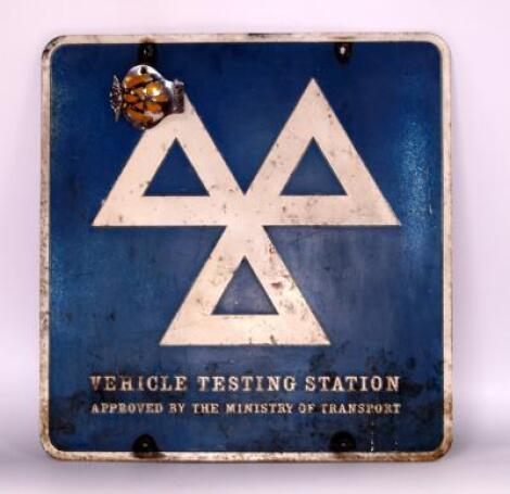 An MOT vehicle testing station alloy sign