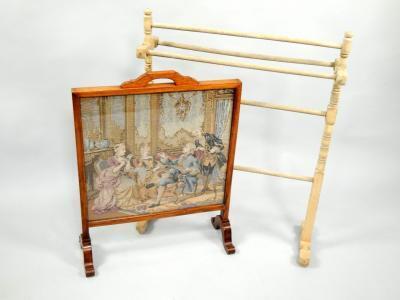 A mahogany framed fire screen