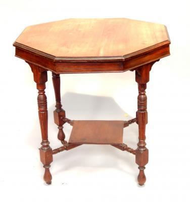 An Edwardian walnut octagonal table