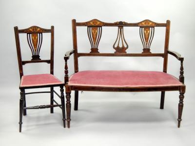 An inlaid mahogany two seater settee