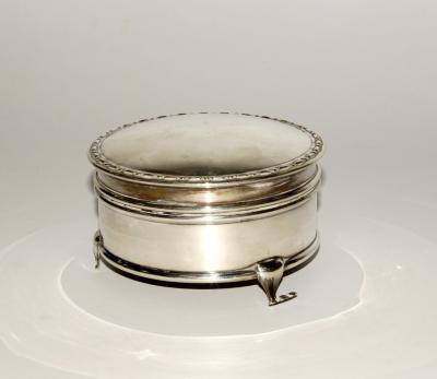 A George V silver circular jewel box