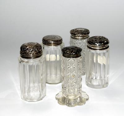 Five silver capped cut glass dressing table jars