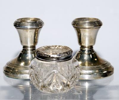 A pair of modern silver dwarf candlesticks