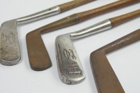 Four No 9 putters