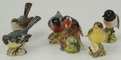 A collection of six small Beswick bird figures