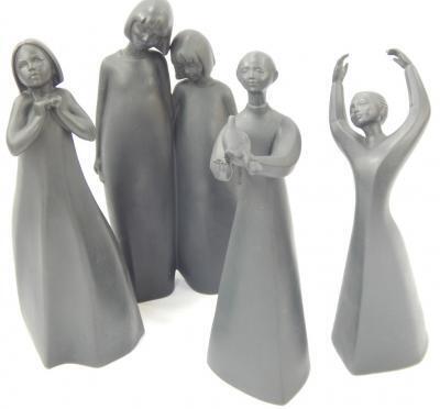 Four Royal Doulton Images figures