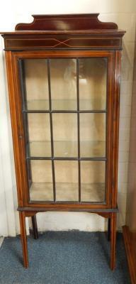 An Edwardian mahogany glazed cabinet