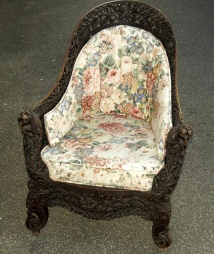 An Anglo Indian carved hardwood bergere chair