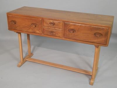 An Ercol light elm sideboard