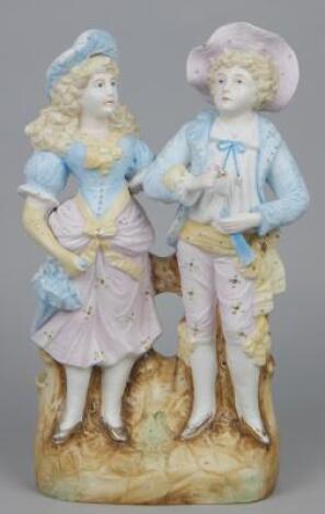 A late 19thC German bisque porcelain figure group