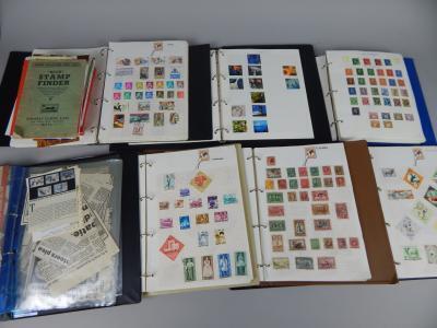 A small accumulation of boxed world stamps