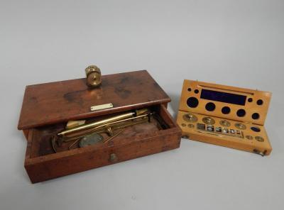 A set of brass and mahogany chemists scales