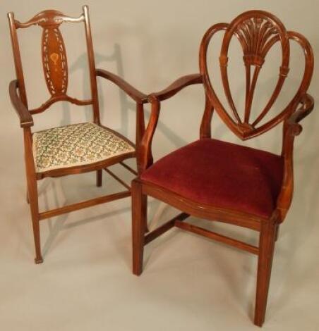 An Edwardian mahogany and marquetry open armchair