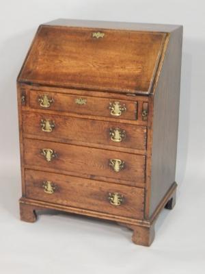 An oak bureau in George III style