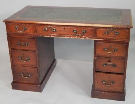 A late Victorian mahogany pedestal desk