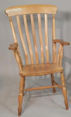 A 19thC lath back ash and elm armchair