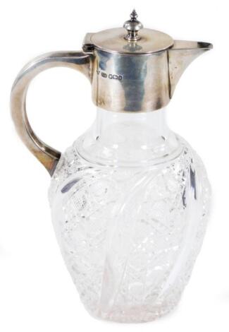 A Victorian silver and cut glass water jug