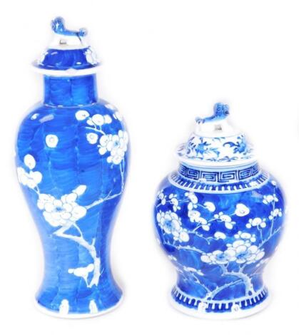 A Chinese Qing period blue and white porcelain prunus vase