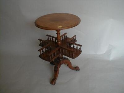 A Victorian oak occasional table with moulded circular top on a turned