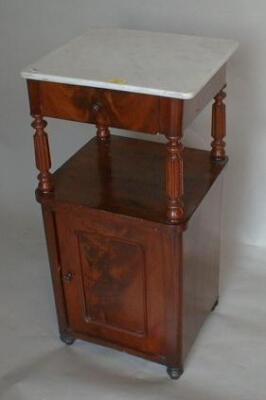 A Victorian flamed mahogany night table with marble top