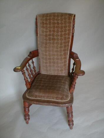 A 19thC Yorkshire broadseat grandfather chair with upholstered back and seat