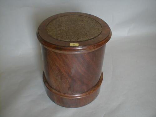 A Victorian mahogany cylindrical commode with moquette inset top