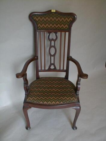 A late 19thC mahogany open armchair with part upholstered and pierced high back
