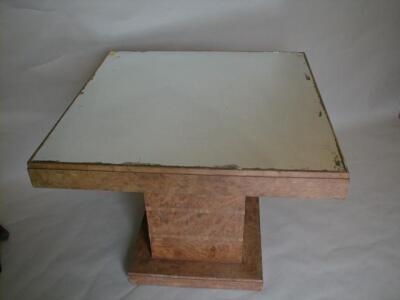 An Art Deco burr walnut centre table with mirror top