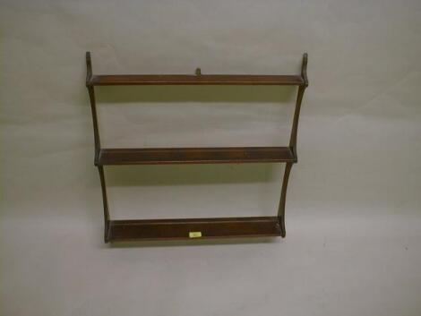 A set of 19thC mahogany wall shelves of waterfall design 24" wide