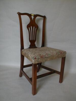 A pair of George III mahogany dining chairs with pierced vase splats