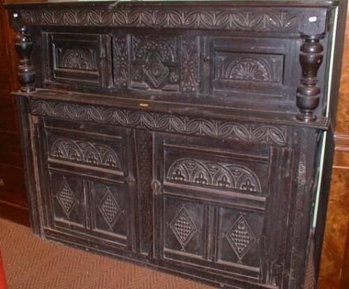 A Jacobean oak court cupboard