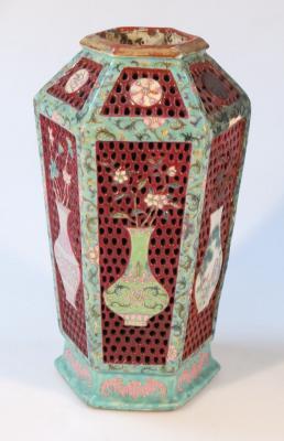 A Chinese porcelain and enamel vase