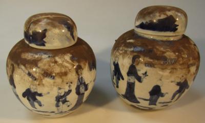 A pair of 18thC Chinese Yong Zheng blue and white jars and covers