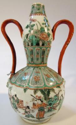 A Chinese porcelain Ming gourd vase