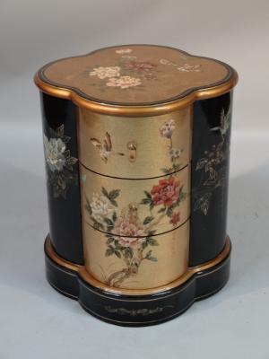 A 20thC Chinese lacquer finish and giltwood cabinet