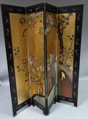 A 20thC Chinese lacquer finish four fold dressing or dividing screen