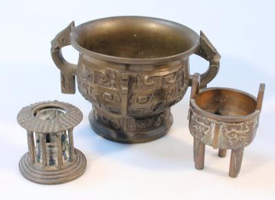 A 20thC oriental designed bronzed censer