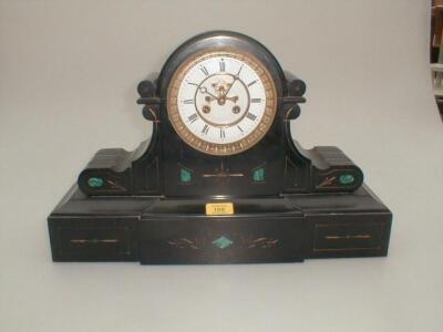 A 19thC polished slate mantel clock of architectural form and having scratched