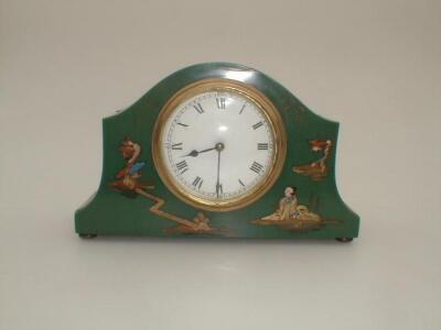 An early 20thC green ground chinoiserie mantel clock on ball feet 9" wide 6" high