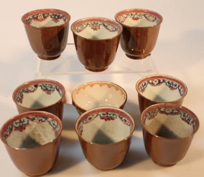 Nine various late 19thC brown glazed porcelain tea bowls