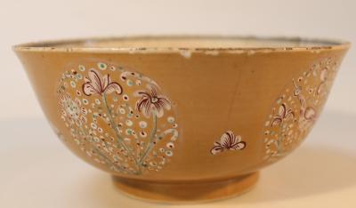 A porcelain brown glazed bowl